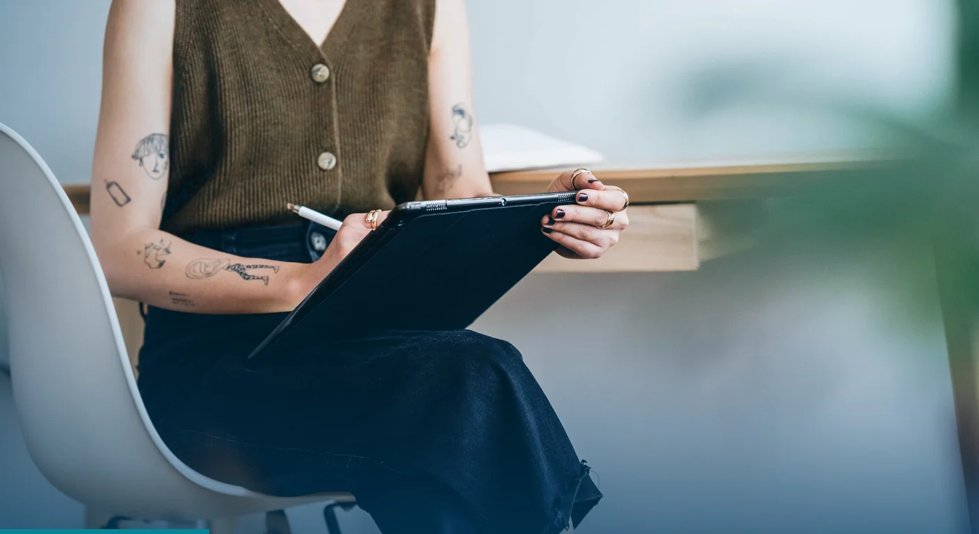 Designer sketching on a tablet with a stylus