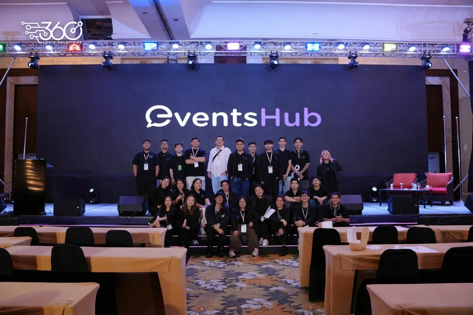 The 360 Logix events team on site at the PAPSHPI Aesthetic Summit 2026, with the stage lights and truss behind them