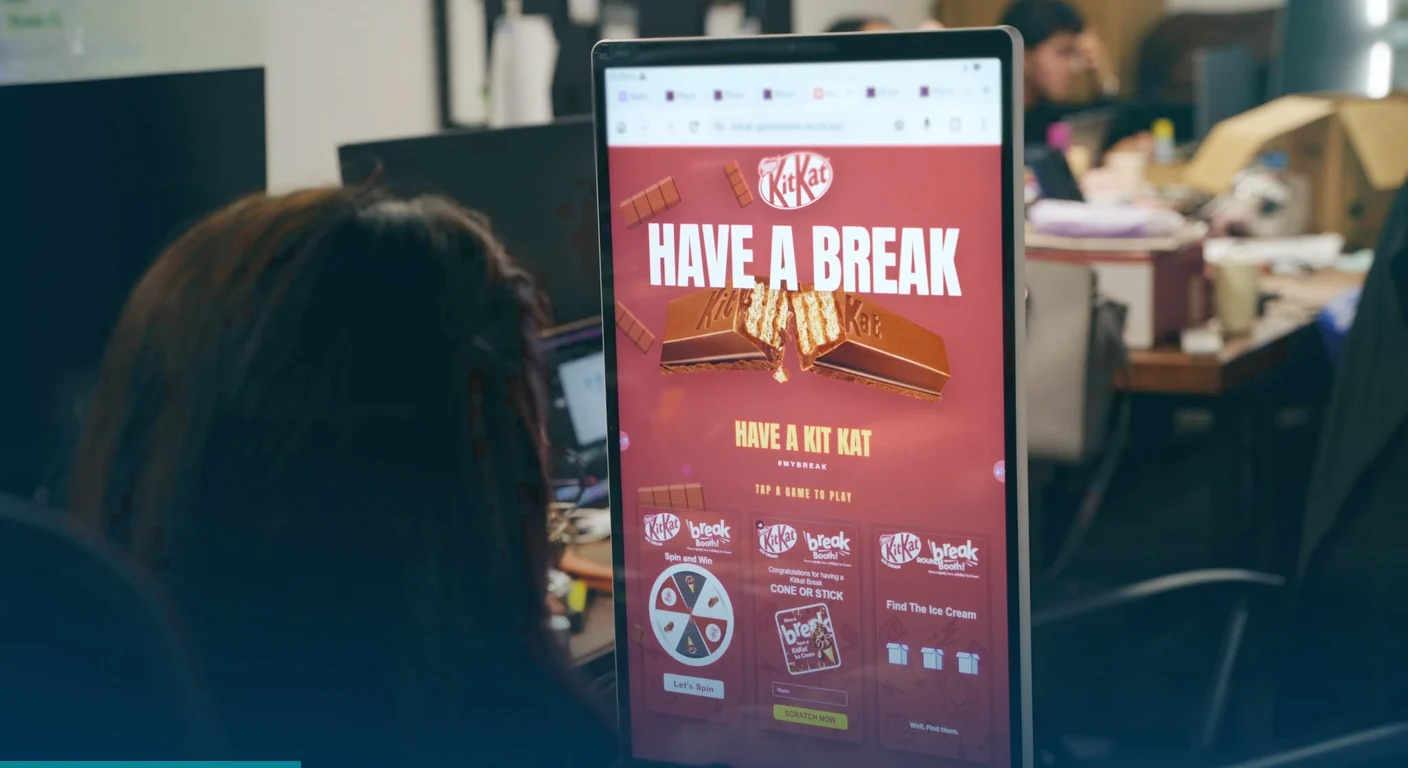 KitKat game menu on a portrait touchscreen, built by 360 Logix, a brand activation agency in the Philippines