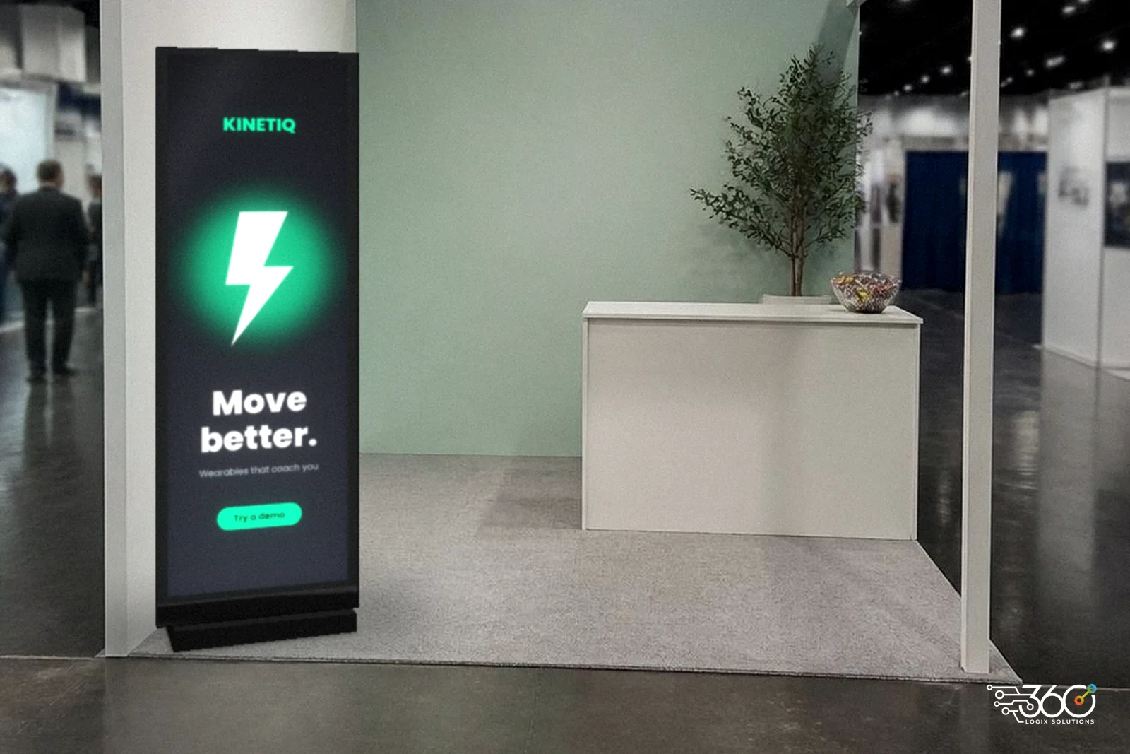 LED Poster at a booth front in an exhibit hall, showing a bold product message to passing guests