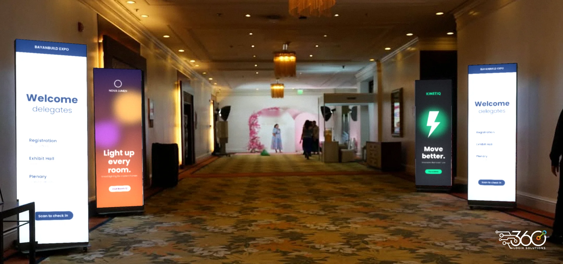 LED Poster rental: four LED Posters lining a hotel hallway at an event