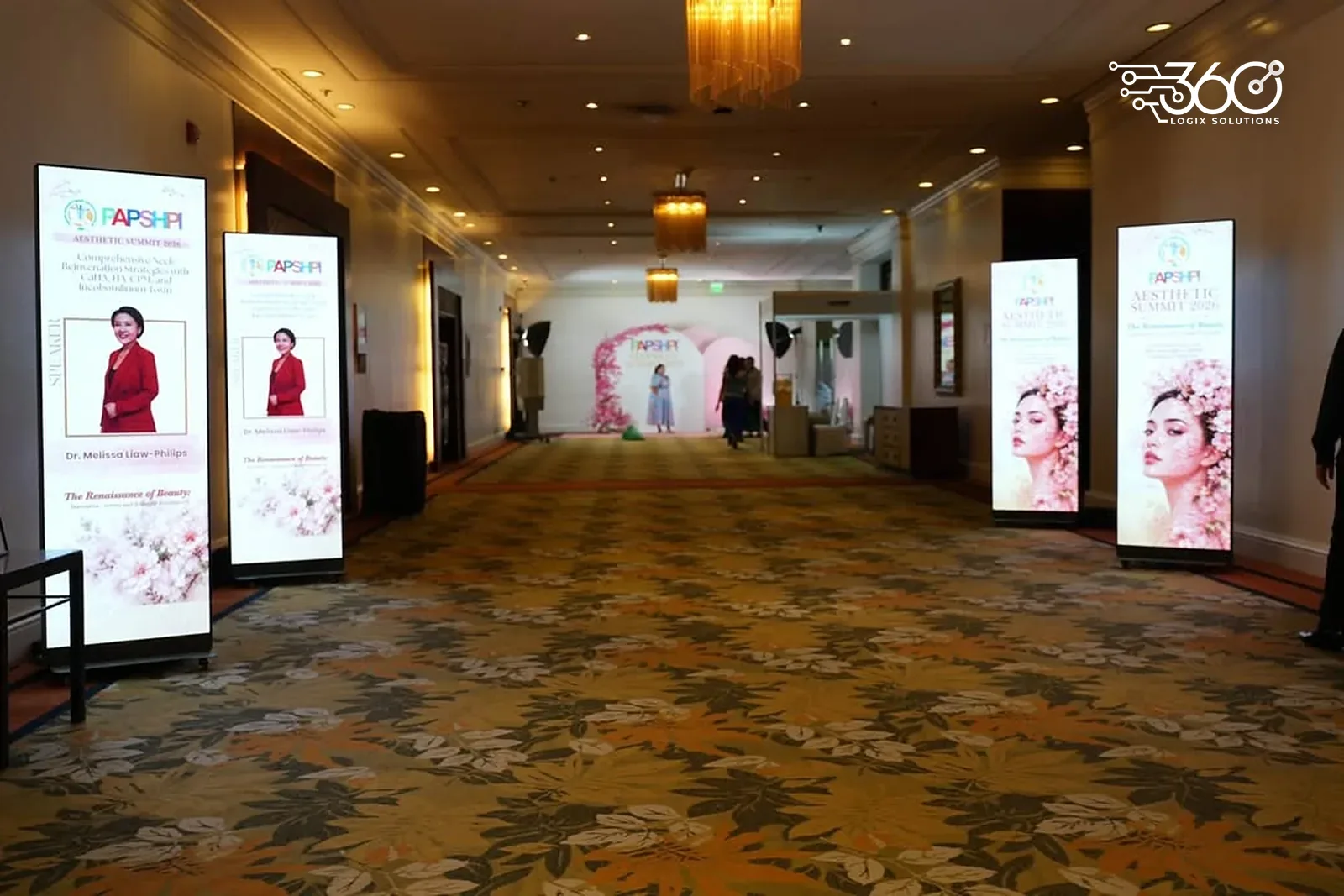 Event hallway at the PAPSHPI Aesthetic Summit 2026 lined with LED Posters showing speaker profiles and the summit key visual.