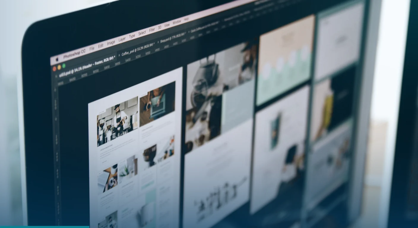 Web page layouts open on a designer's monitor